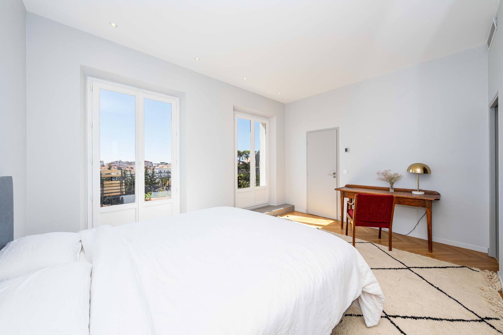 Master bedroom with balcony doors